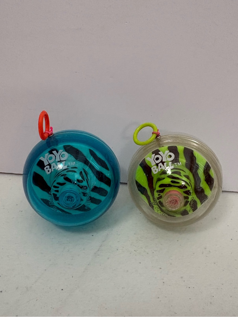 YoYo Ball Lot of 2 Vintage 1999 Yo-Yo Ball Toys blue & green with zebra stripes